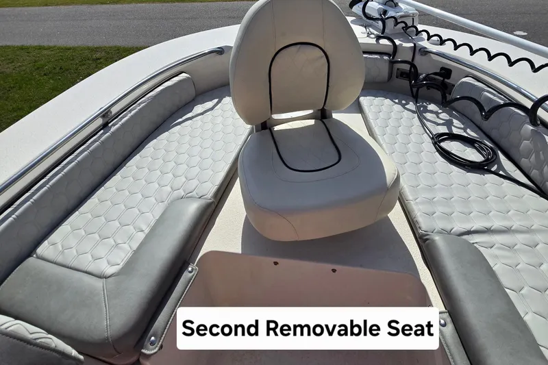 Slide: The Image of 2024 Carolina Skiff 24 Ultra Elite boat with second removable seat feature. - 23