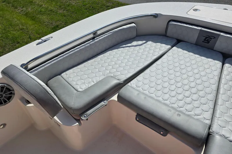 Slide: The Image of 2024 Carolina Skiff 24 Ultra Elite boat with luxurious gray seating and stylish design. - 27