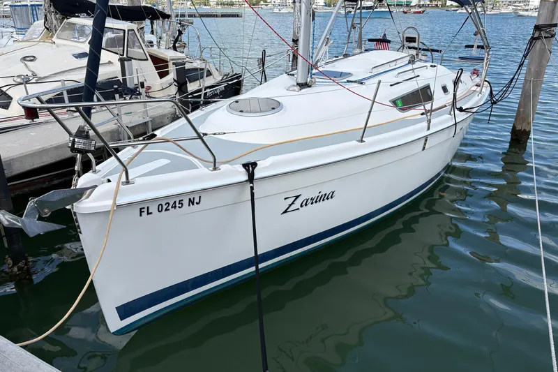 The Image of 2006 Hunter 31 sailboat named Zarina docked in marina. - 0