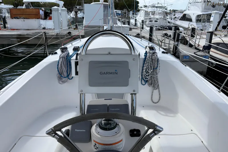 Slide: The Image of Cockpit of 2006 Hunter 31 sailboat with Garmin navigation system at marina. - 14
