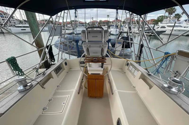 Slide: The Image of Cockpit view of 1998 Island Packet 40 sailboat docked in marina. - 34