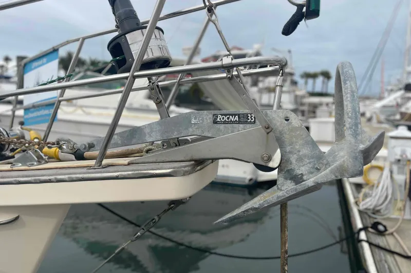 Slide: The Image of 1998 Island Packet 40 sailboat with Rocna 33 anchor at marina. - 48