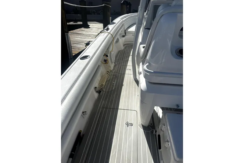 Slide: The Image of 2020 Intrepid 327 Center Console boat deck with sleek design and modern features. - 11