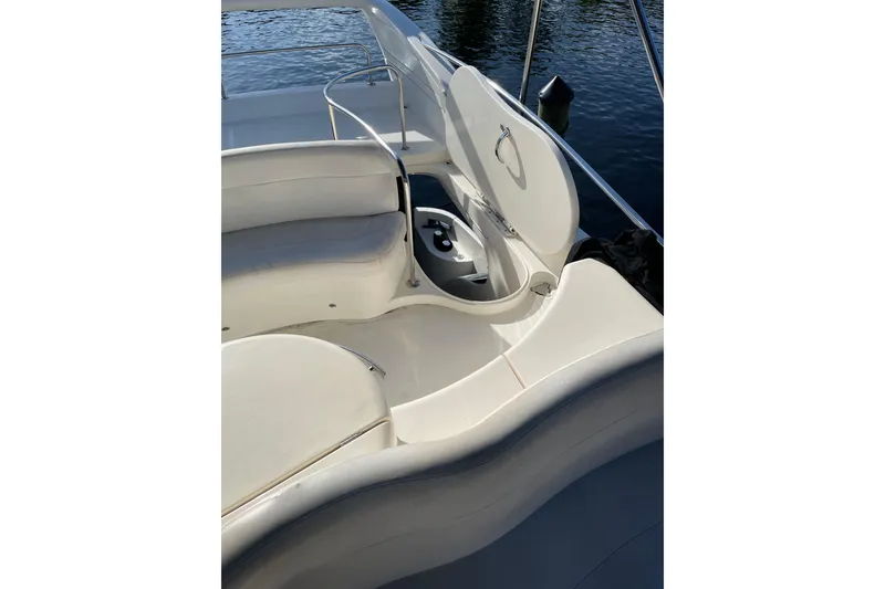 Slide: The Image of 2000 Azimut 46 Flybridge MY yacht interior with open storage compartment. - 100