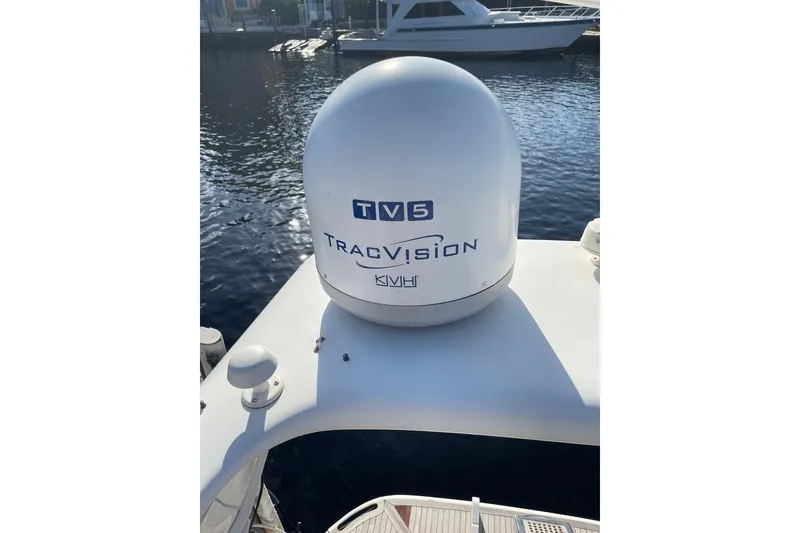 Slide: The Image of Azimut 46 Flybridge MY 2000 with TracVision TV5 satellite dome on deck. - 102