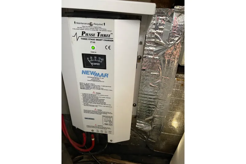 Slide: The Image of Newmar Phase Three smart charger in 2000 Azimut 46 Flybridge MY yacht. - 107