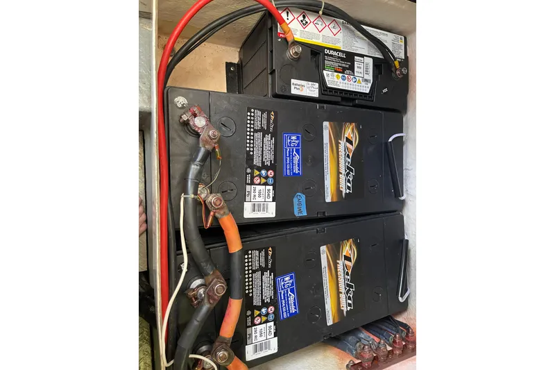 Slide: The Image of Battery setup in a 2000 Azimut 46 Flybridge MY yacht engine compartment. - 119