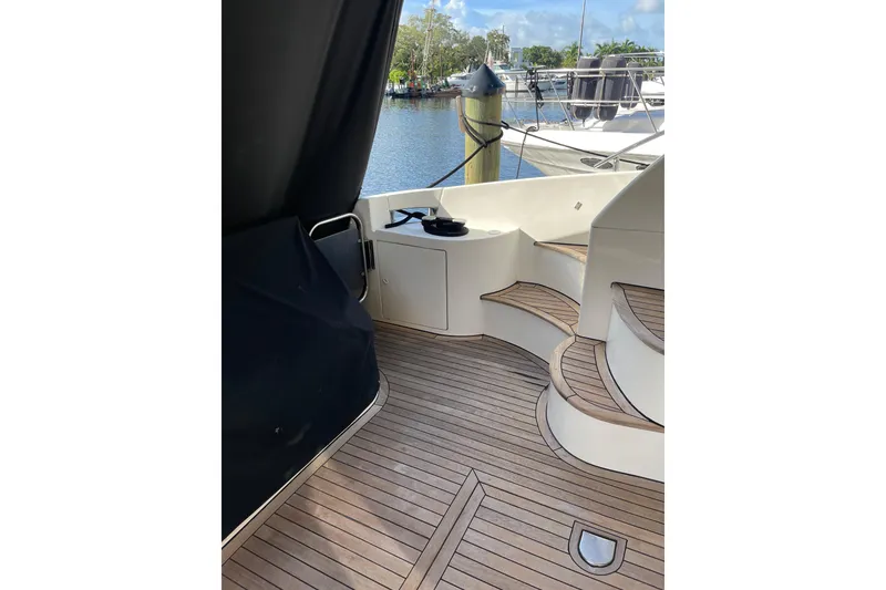 Slide: The Image of Azimut 46 Flybridge MY 2000 yacht with teak deck and elegant curved steps. - 20
