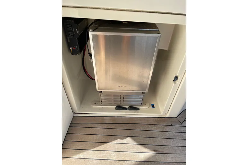 Slide: The Image of Azimut 46 Flybridge MY 2000 yacht interior compartment with electrical components. - 23