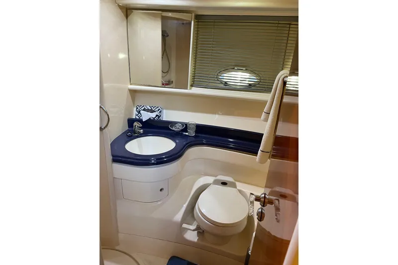 Slide: The Image of Luxurious bathroom in 2000 Azimut 46 Flybridge yacht, featuring modern fixtures and elegant design. - 37