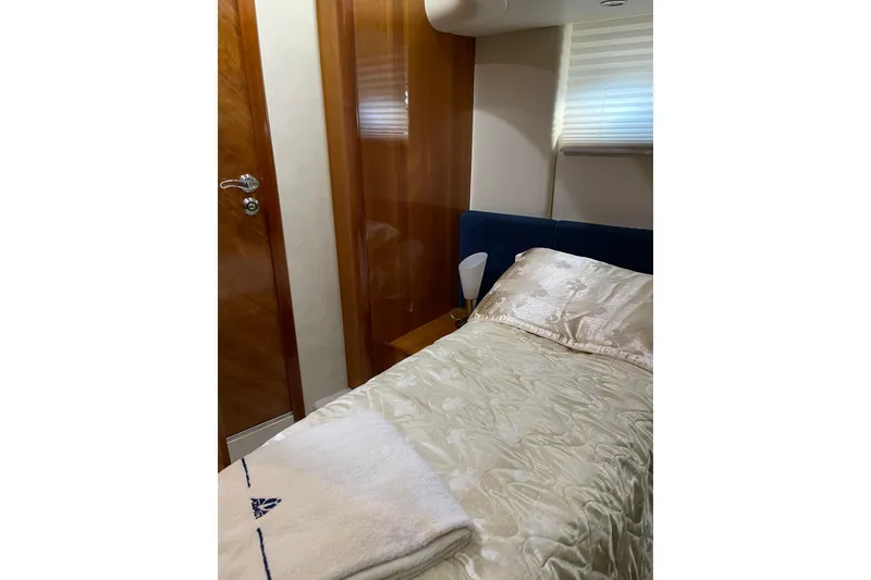 Slide: The Image of Luxurious cabin interior of 2000 Azimut 46 Flybridge MY yacht with elegant bedding. - 41