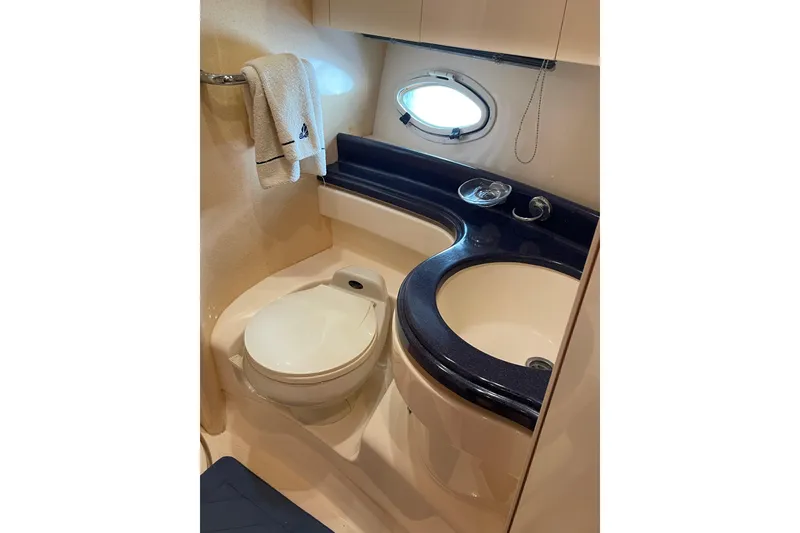Slide: The Image of Bathroom interior of 2000 Azimut 46 Flybridge MY yacht, featuring toilet and sink. - 52