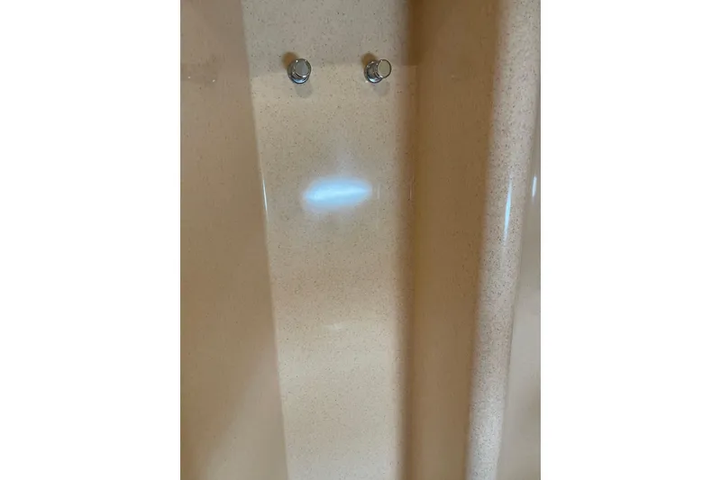 Slide: The Image of Interior detail of 2000 Azimut 46 Flybridge MY yacht, featuring beige paneling. - 54