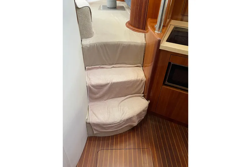 Slide: The Image of Interior stairs of 2000 Azimut 46 Flybridge MY yacht with wooden flooring. - 55