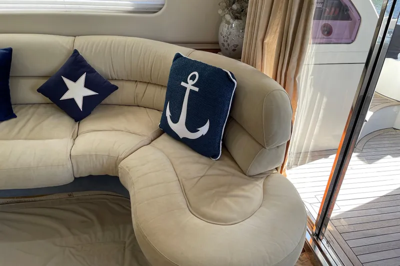 Slide: The Image of Luxurious Azimut 46 Flybridge MY 2000 yacht interior with nautical-themed cushions. - 58
