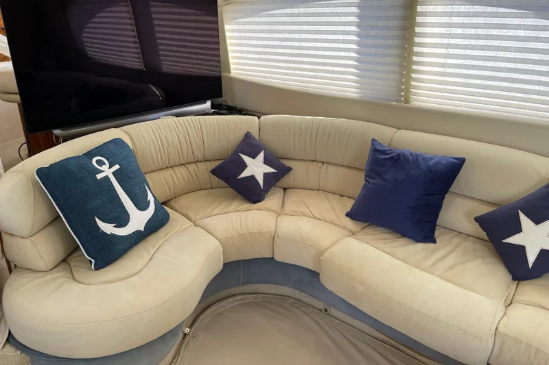 Slide: The Image of Luxurious Azimut 46 Flybridge MY 2000 yacht interior with nautical-themed cushions. - 61