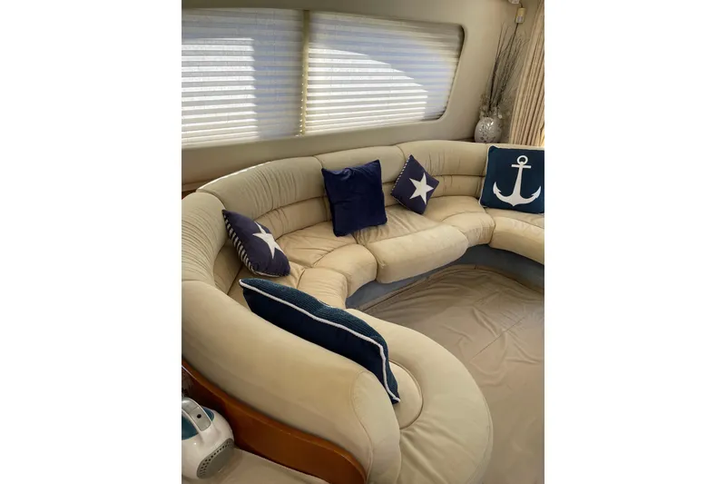Slide: The Image of Luxurious interior of 2000 Azimut 46 Flybridge yacht with nautical-themed cushions. - 64