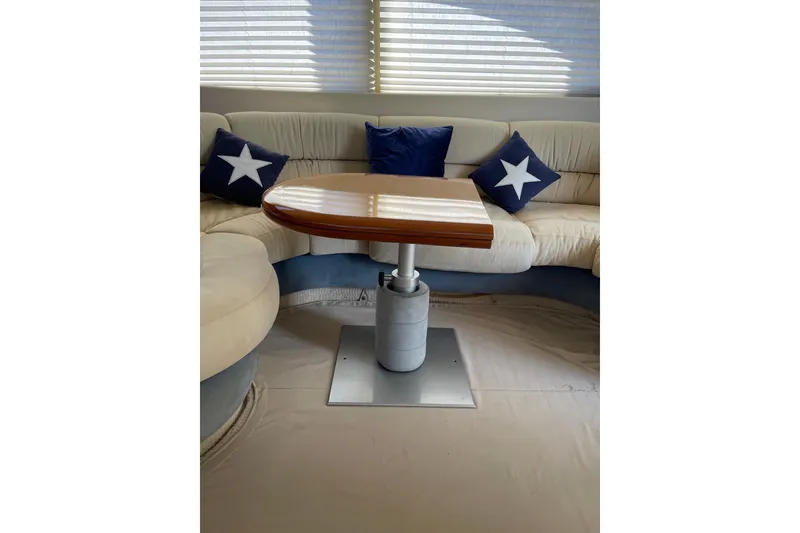 Slide: The Image of Luxurious interior of 2000 Azimut 46 Flybridge MY with elegant seating and table. - 67