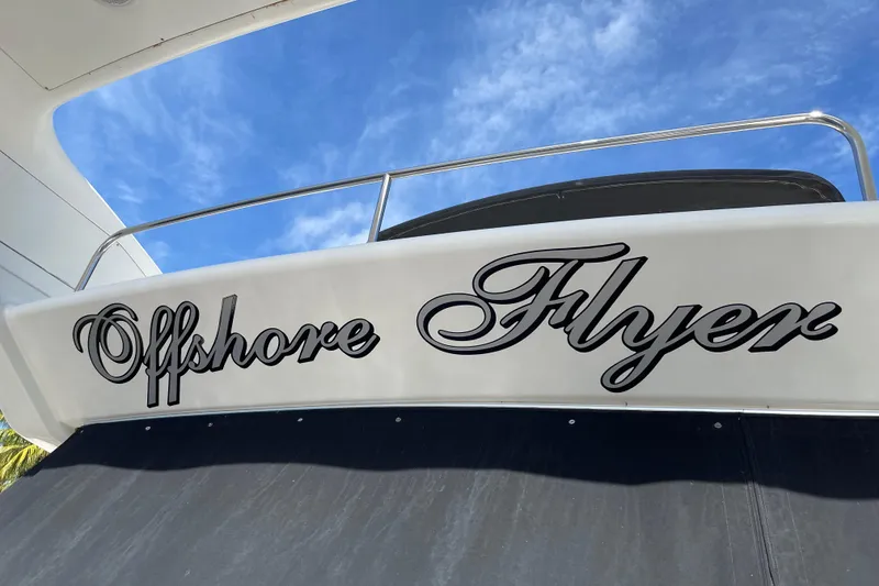 Slide: The Image of Azimut 46 Flybridge MY 2000 with "Offshore Flyer" name, blue sky background. - 7