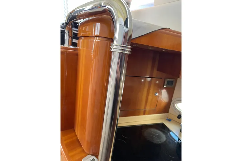 Slide: The Image of Interior of 2000 Azimut 46 Flybridge MY yacht with polished wood and chrome details. - 76