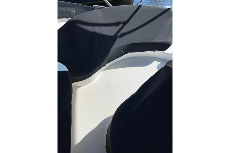 Slide: The Image of Azimut 46 Flybridge MY 2000 boat seating area with protective covers. - 80