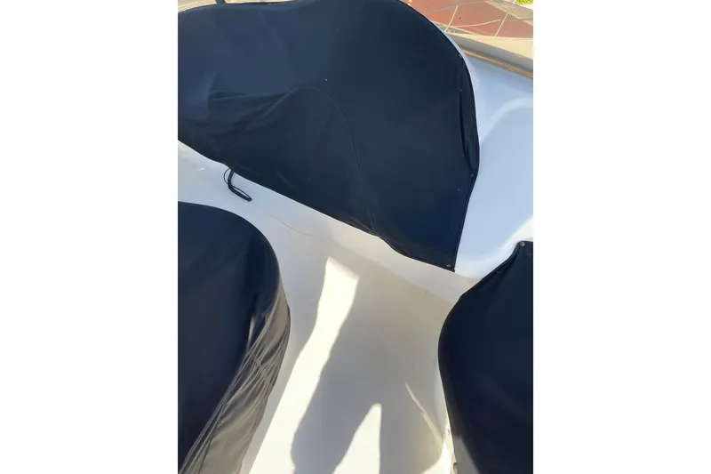 Slide: The Image of Azimut 46 Flybridge MY 2000 boat with covered seating area. - 81