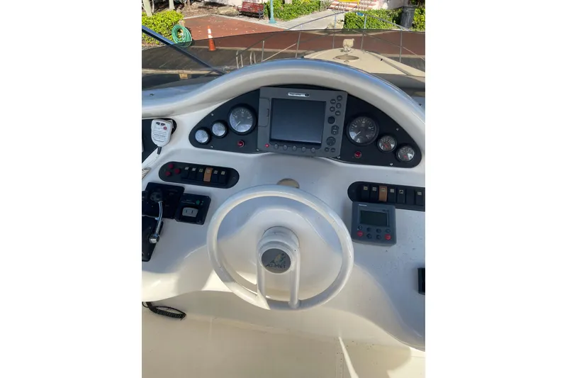 Slide: The Image of Helm of 2000 Azimut 46 Flybridge MY with steering wheel and navigation instruments. - 91