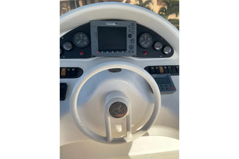 Slide: The Image of Helm of 2000 Azimut 46 Flybridge MY with steering wheel and navigation instruments. - 92