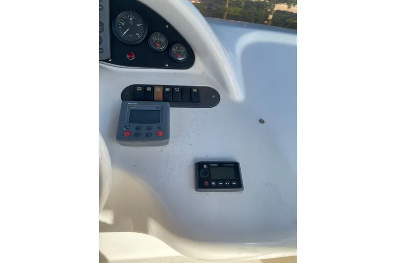 Slide: The Image of Control panel of 2000 Azimut 46 Flybridge MY yacht with gauges and electronic devices. - 95