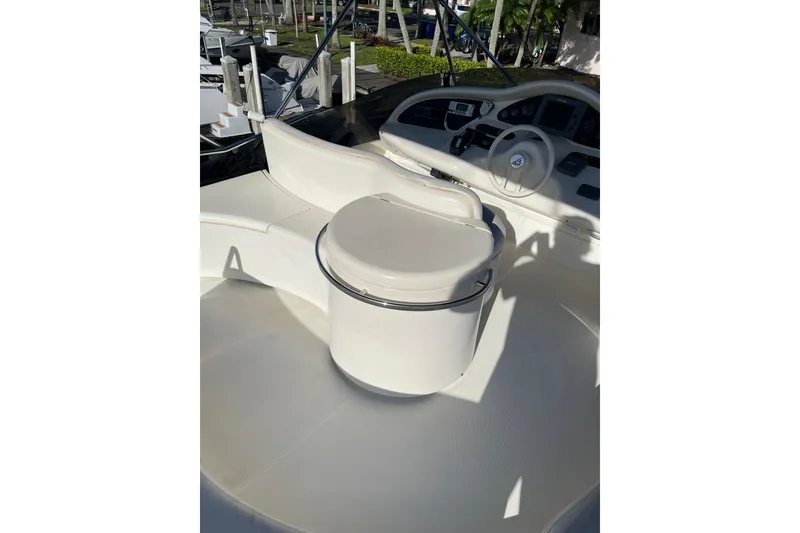 Slide: The Image of Flybridge helm of 2000 Azimut 46 Flybridge MY yacht with seating and controls. - 96