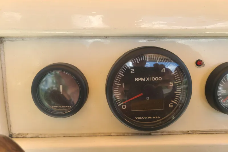 Slide: The Image of Dashboard of a 1964 Holmes 25 Cuddy boat with Volvo Penta gauges. - 16