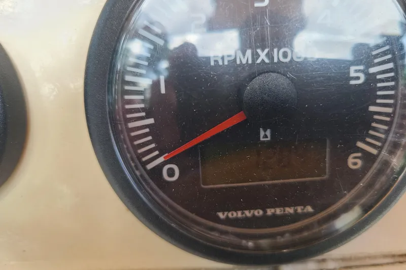 Slide: The Image of Close-up of a Volvo Penta RPM gauge on a 1964 Holmes 25 Cuddy boat. - 17