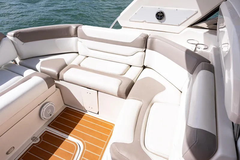 Slide: The Image of Luxurious seating on 2008 Monterey 400 Sport Yacht with elegant white and beige upholstery. - 22