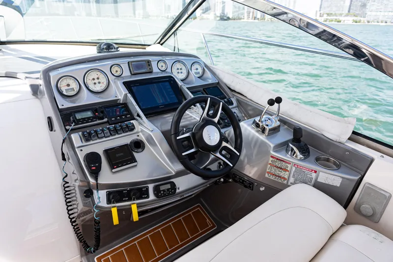 Slide: The Image of Helm of 2008 Monterey 400 Sport Yacht with steering wheel and control panel. - 27