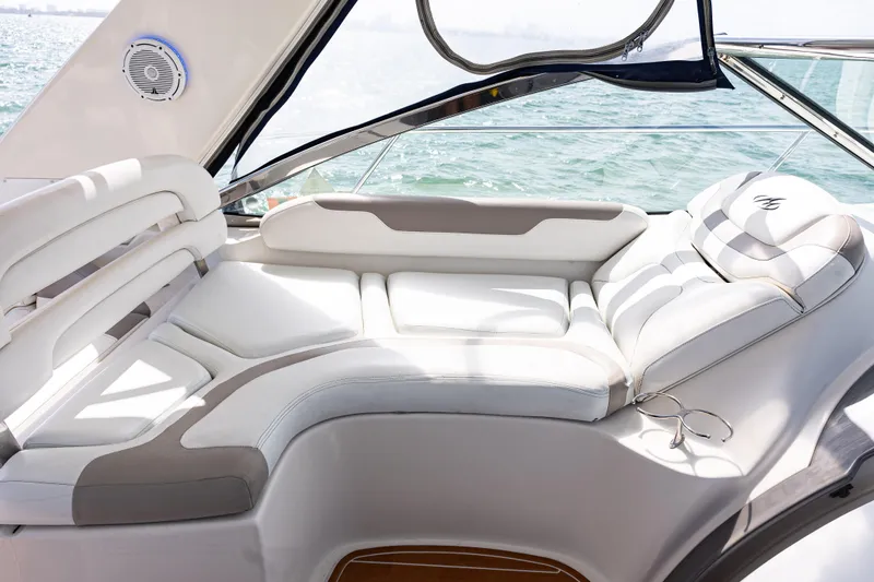 Slide: The Image of Luxurious seating on a 2008 Monterey 400 Sport Yacht, overlooking serene waters. - 28
