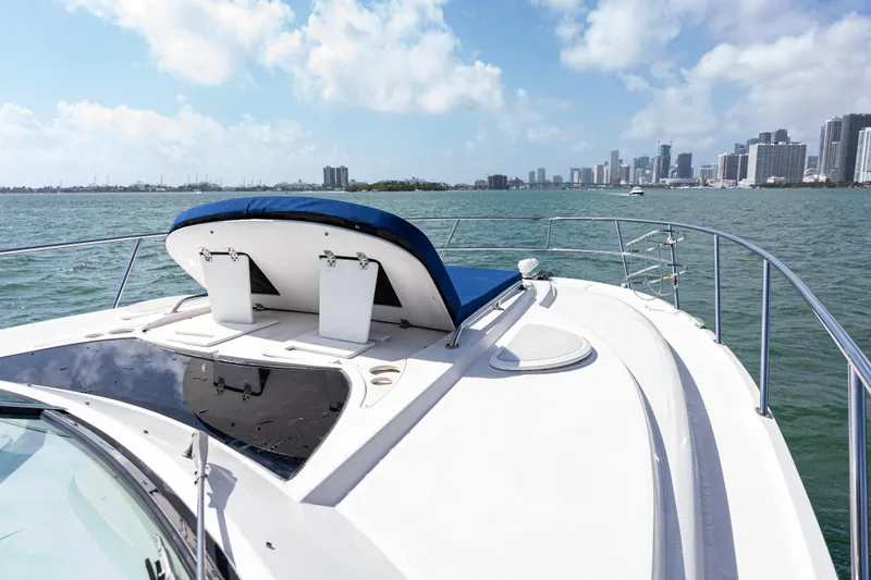 Slide: The Image of 2008 Monterey 400 Sport Yacht cruising near city skyline on a sunny day. - 34