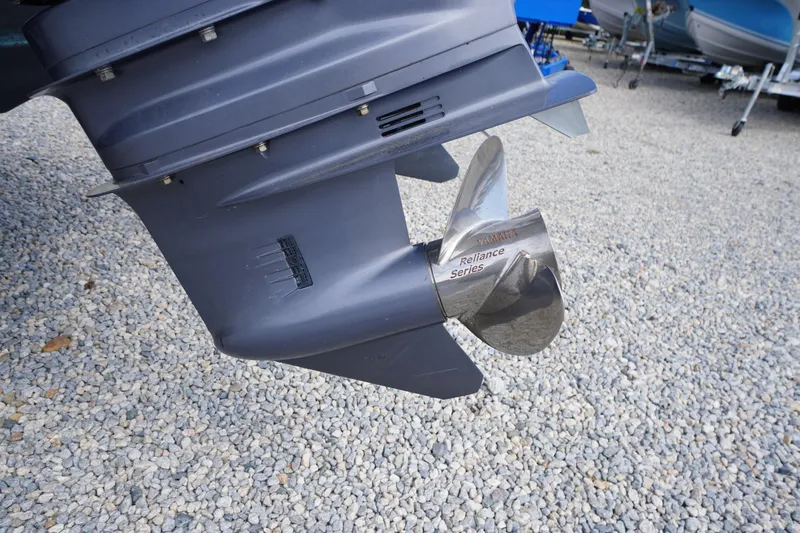 Slide: The Image of Close-up of Yamaha Reliance Series propeller on 2018 May-Craft 2700 Pilot XL boat. - 44