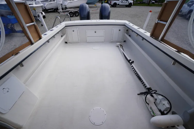 Slide: The Image of 2018 May-Craft 2700 Pilot XL boat deck, spacious and clean, with storage compartments. - 7