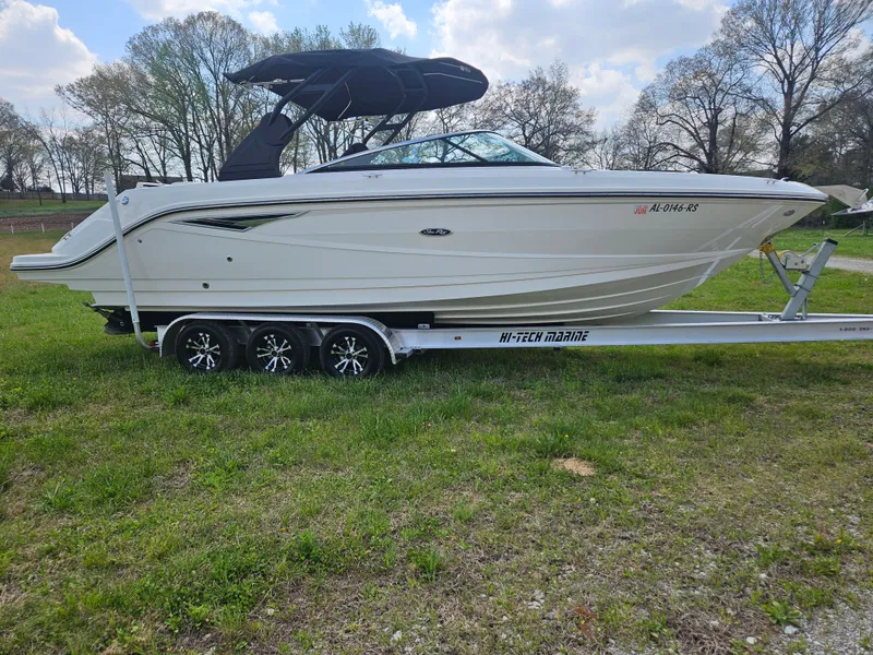 The Image of 2021 Sea Ray SLX 280 boat on trailer outdoors. - 0