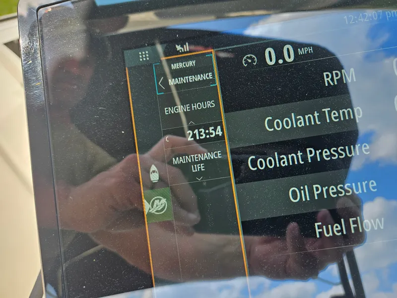 Slide: The Image of Sea Ray SLX 280 2021 display showing maintenance information. - 17