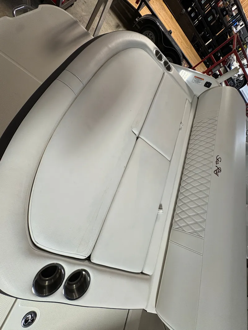 Slide: The Image of Interior of a 2021 Sea Ray SLX 280 boat with white upholstery. - 22