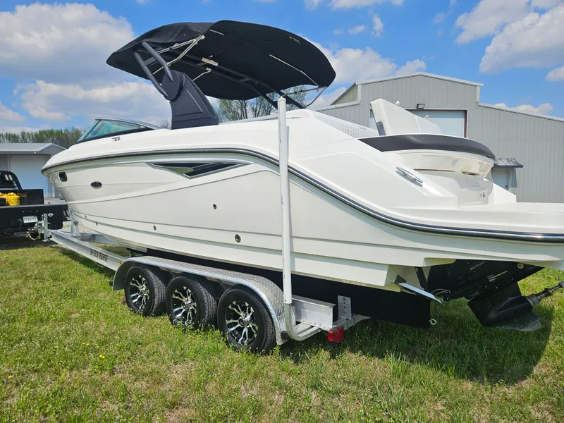 Slide: The Image of 2021 Sea Ray SLX 280 boat on trailer outdoors. - 3