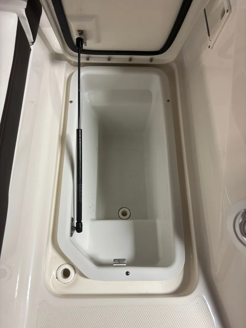 Slide: The Image of Storage compartment in 2021 Sea Ray SLX 280 boat. - 31