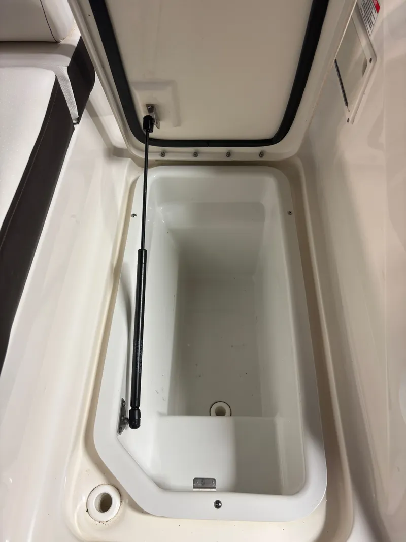 Slide: The Image of Storage compartment in 2021 Sea Ray SLX 280 boat. - 32