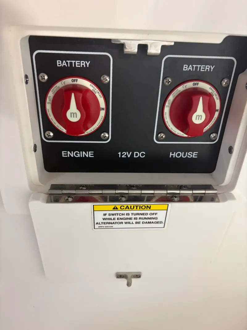 Slide: The Image of Battery switches for Sea Ray SLX 280, 2021, with caution label. - 33