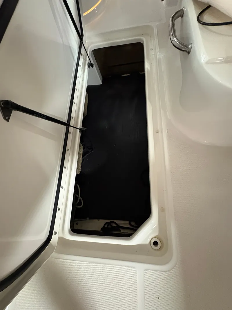 Slide: The Image of Storage compartment in Sea Ray SLX 280 boat, 2021 model. - 36