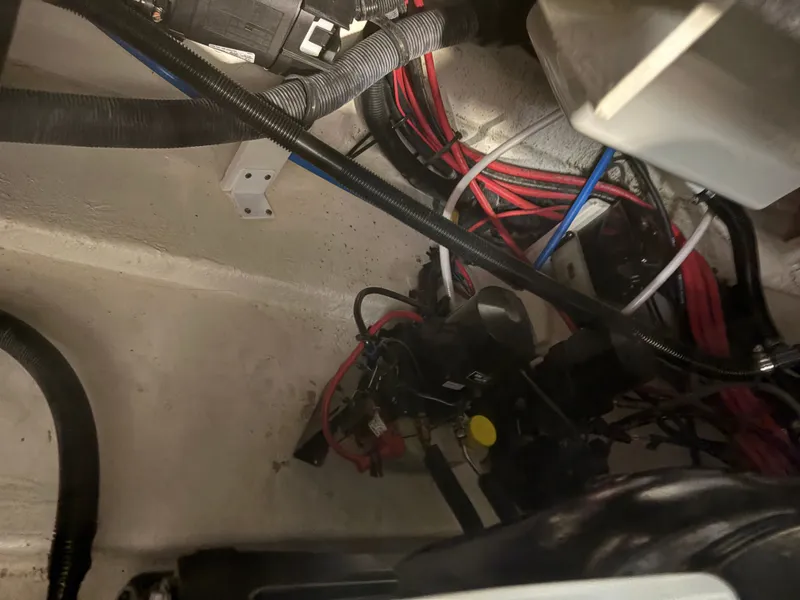 Slide: The Image of Interior view of a 2021 Sea Ray SLX 280 boat engine compartment. - 46