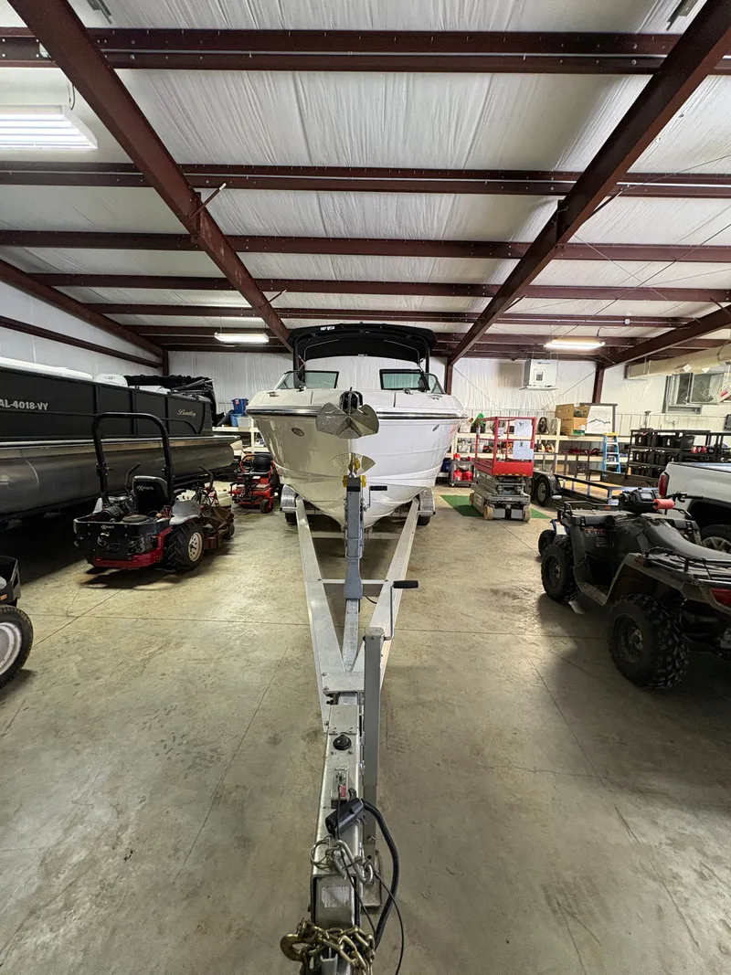 Slide: The Image of 2021 Sea Ray SLX 280 boat in warehouse on trailer. - 6