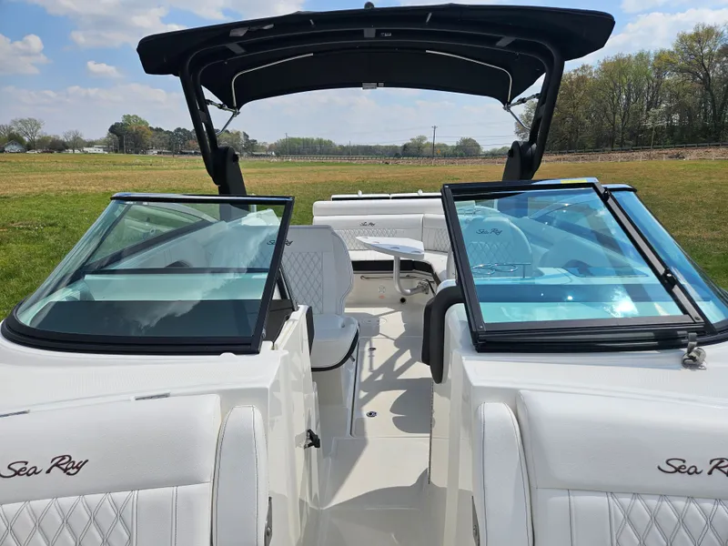 Slide: The Image of Interior view of a 2021 Sea Ray SLX 280 boat with open canopy. - 7