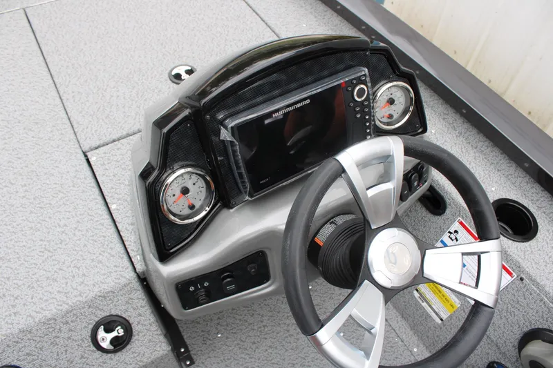 Slide: The Image of Steering console of 2025 G3 Sportsman 1810 boat with gauges and navigation system. - 16